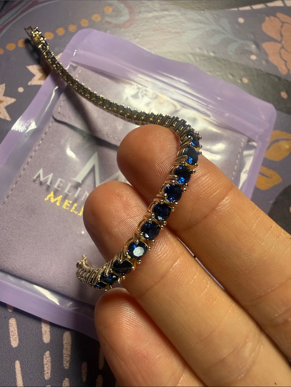 Melinda Maria Blue Crystal Tennis Bracelet - gold Tone